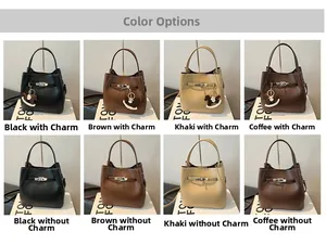 Close-up showing various colors of lychee grain leather bucket bags with metal locks