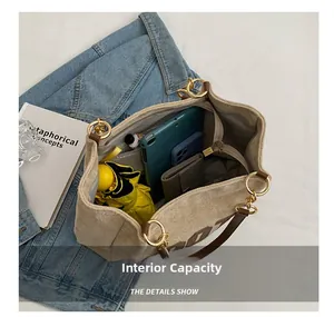 Internal view showing large storage capacity of this beige tote bag for daily essentials
