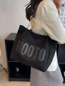 Black suede-textured HOOTO tote bag with gold chain strap for daily college use