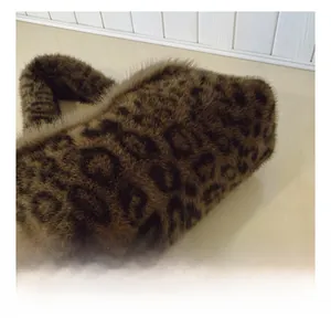 Close-up detail of plush faux fur leopard print tote bag with soft texture finish