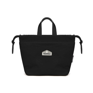 Detail of waterproof nylon tote bag with hexagon brand logo and drawstring side