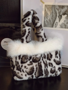 Winter plush tote bag with black and white leopard print and faux fur trim handles
