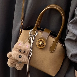 Modische braune Damen-Handtasche aus Wildleder-Imitat mit Ledergriff und goldenem Schloss