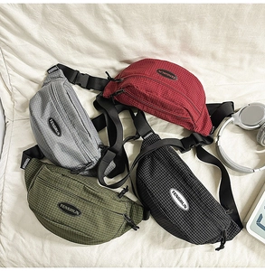 Close-up of lightweight textured plaid crossbody bags in four colors with nylon straps