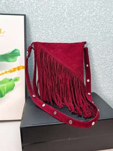Vintage burgundy suede crossbody bucket bag with long tassels and silver metal rivets
