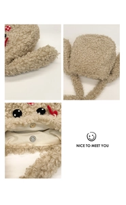 Dettagli della borsa tote in peluche kaki con orecchie di coniglio e chiusura magnetica