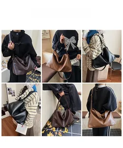Múltiples vistas de bolsos de mano grandes de cuero sintético en marrón y negro