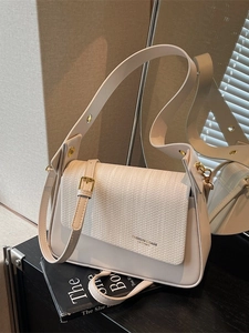Chic cream white leather shoulder bag with woven texture flap and golden hardware