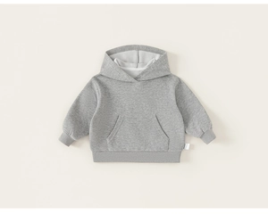 Detail view of heather gray kids hoodie showing soft cotton fabric and ribbed cuffs