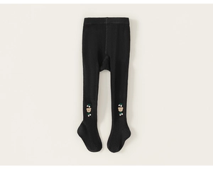Close-up of black ribbed cotton baby leggings featuring cute bear and cherry embroidery