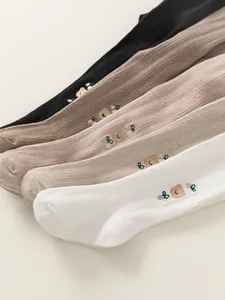 Ribbed knit baby girl leggings with cute bear embroidery in four classic colors
