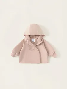 Pink hooded windbreaker for girls featuring front pockets and ribbed cuffs in a flat lay view