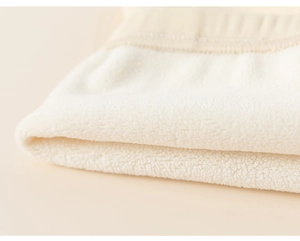 Close-up of the soft fleece lining and elastic ribbed cuffs on toddler girl leggings