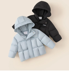Detailed view of quilted puffer jackets for kids in black and light blue options