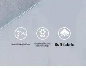 Detailed macro view of light blue padded jacket fabric with neat premium stitching