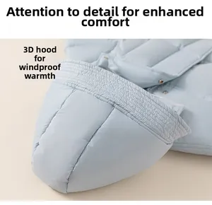 Detail view of light blue children hooded down jacket with windproof stitching details