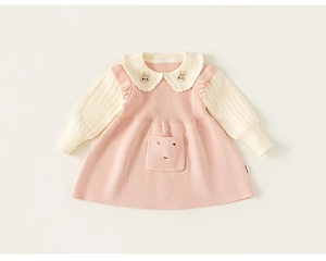 Detail of pink knit dress with Peter Pan collar and rabbit embroidery for girls