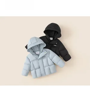 Flat lay of blue and black hooded down jackets showing quilted warmth design