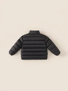 Doudoune légère noire pour enfant avec col montant et motif matelassé classique