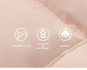 Close-up of pink quilted down jacket fabric featuring skin-friendly and soft texture