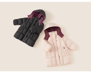 Detail view of long hooded puffer jackets in black and beige with contrasting burgundy lining