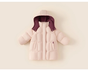 Detail view of pink kids long down jacket with quilted pattern and warm hooded design