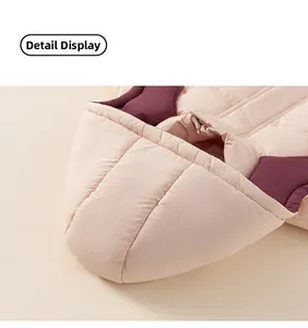 Detail view of pink and purple hooded down coat showing high-quality stitching and fabric