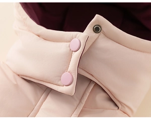 Detail of pink children's down coat featuring warm collar with snap button closure