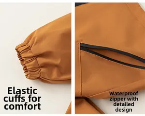 Detail of brown windproof jacket featuring elastic cuffs and waterproof zipper pockets