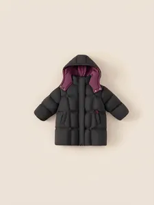Kids long down coat in black with purple contrast hood lining and quilted warmth