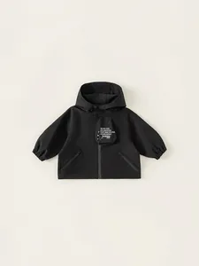Classic black hooded outdoor jacket for boys with functional chest pocket and print