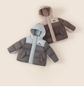 Detailed view of color-block kids down jacket showing INS BOBO print and zip-up hooded design