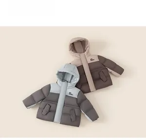 Detail of color-block kids down jacket with hooded design and INS BOBO chest logo