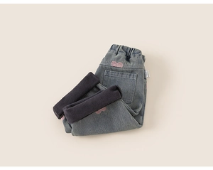 Detail of girls' fleece-lined wide leg jeans with pink heart embroidery and elastic waist
