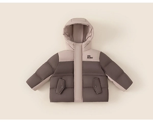 Detailed view of color-block winter down jacket for girls with hood and pockets