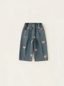 Girls wide-leg jeans with pink heart embroidery and elastic waist in blue denim