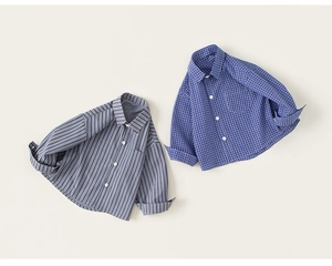 Detailed flat lay of long-sleeve cotton shirts with blue stripes and grid patterns
