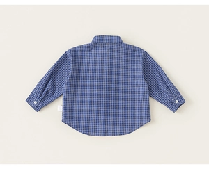Detail view of the back of a blue and white plaid long-sleeve cotton shirt for boys