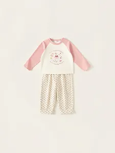 Mädchen Freizeit-Set mit rosa Raglan-Oberteil und schwarzer Polka-Dot-Hose