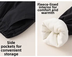 Detail view of boys' winter pants showing side pocket and thick white fleece lining