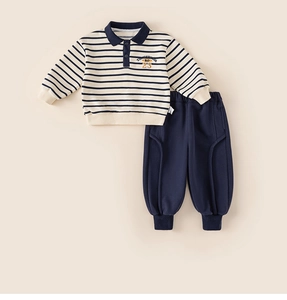 Detailed view of striped cotton polo sweatshirt and navy joggers for toddler boys