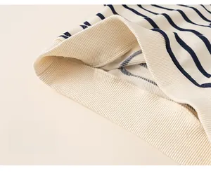 Close-up of boys striped sweatshirt with elastic ribbed hem for a comfortable loose fit