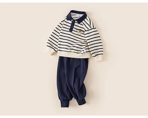 Detail of kids striped polo sweatshirt and jogger pants with number 23 embroidery