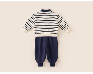 Flat lay of striped polo sweatshirt and navy jogger pants set for toddler boys