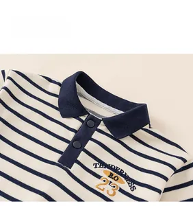 Detail of boys' striped polo sweatshirt showing collar and embroidery texture