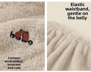 Detail view of plush toddler pajamas with cute animal embroidery and elastic waistband