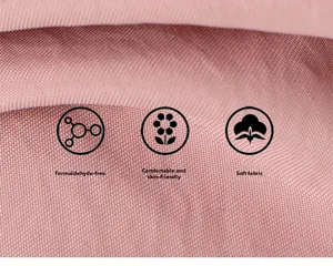 Gros plan détaillé du tissu rose doux avec une texture lisse et un toucher confortable