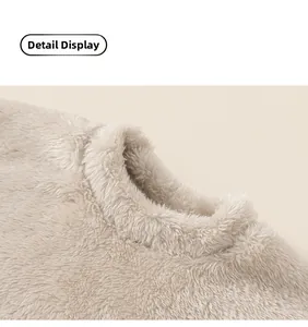 Close-up of the soft beige fleece neckline showing high-density plush texture