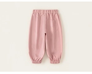 Vue détaillée du pantalon de jogging rose pour filles avec taille et poche arrière