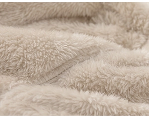 Close-up of premium thick fleece lining texture with fine stitching on thermal pajamas